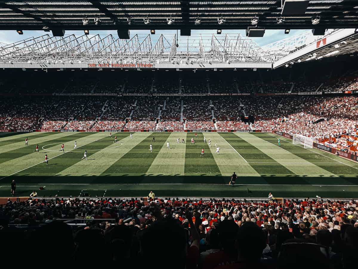 A football match taking place at Old Trafford stadium.