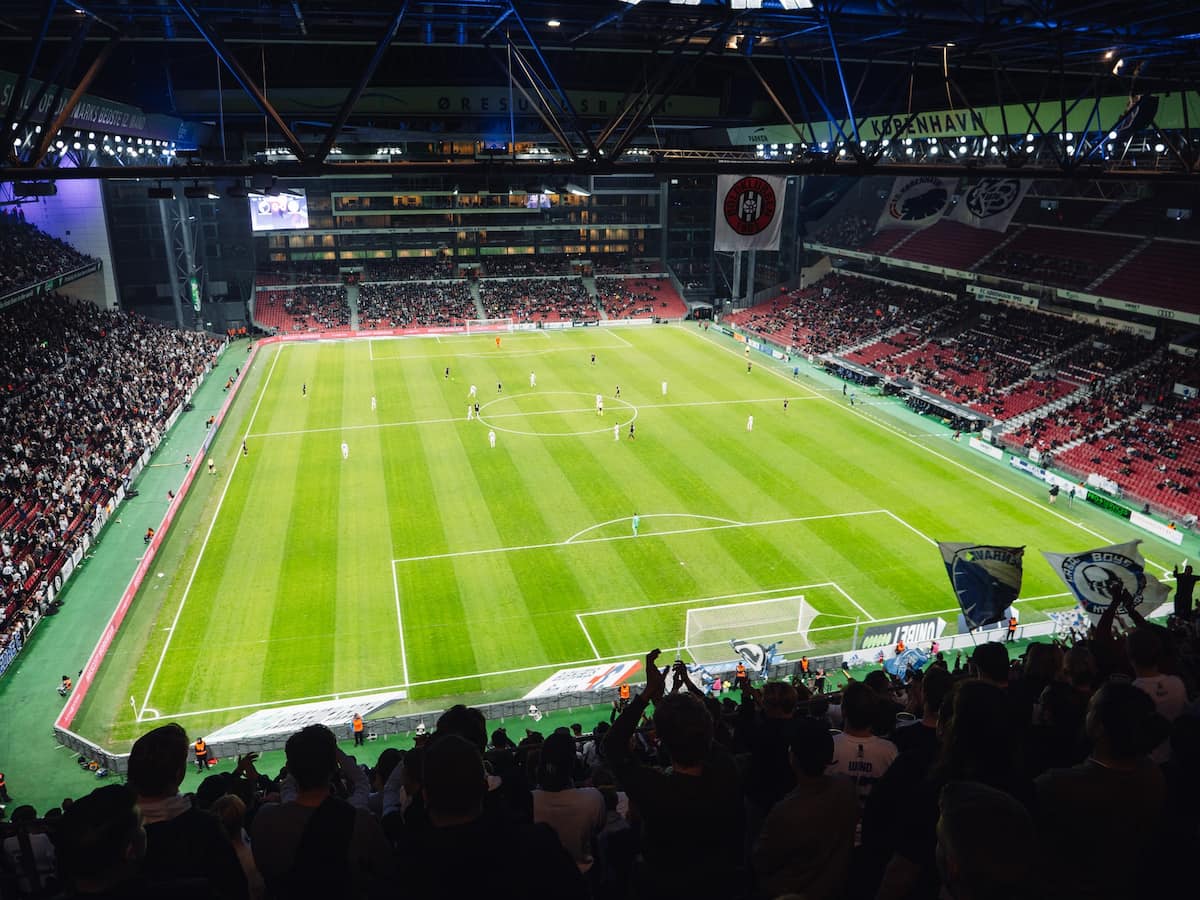 A football match taking place at FC Copenhagen's ground.