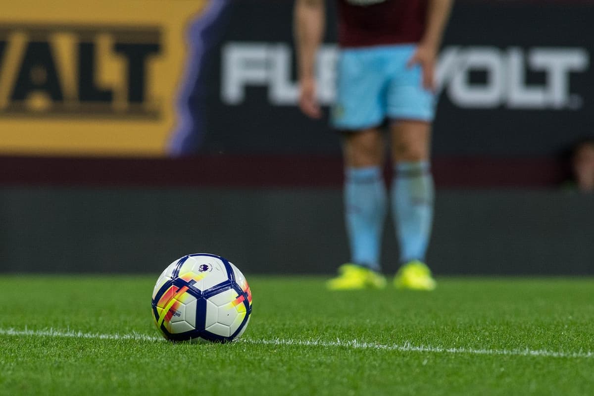 A Premier League football about to be kicked during a league match.