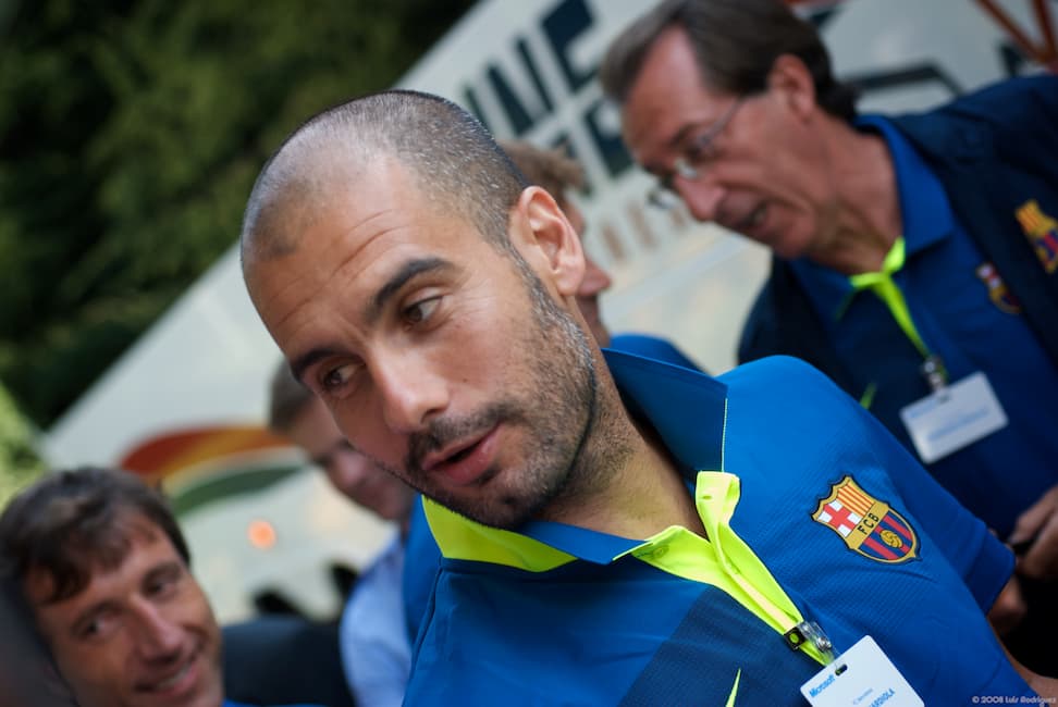 Josep Guardiola wearing an FC Barcelona polo shirt during his period of management of the club.